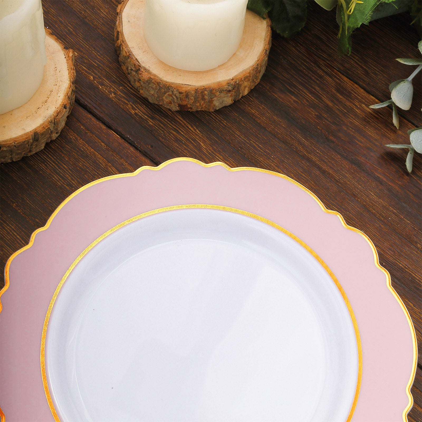Blush white disposable salad plates with gold rim and round blossom design.