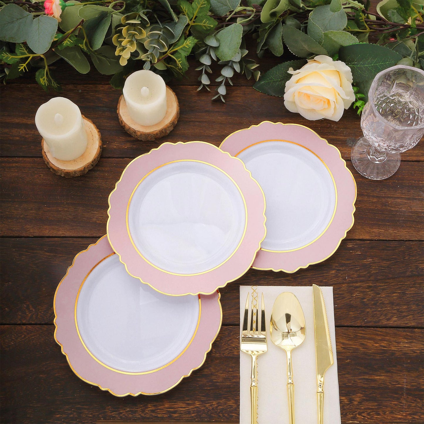 Blush white disposable salad plates with gold rim and round blossom design.
