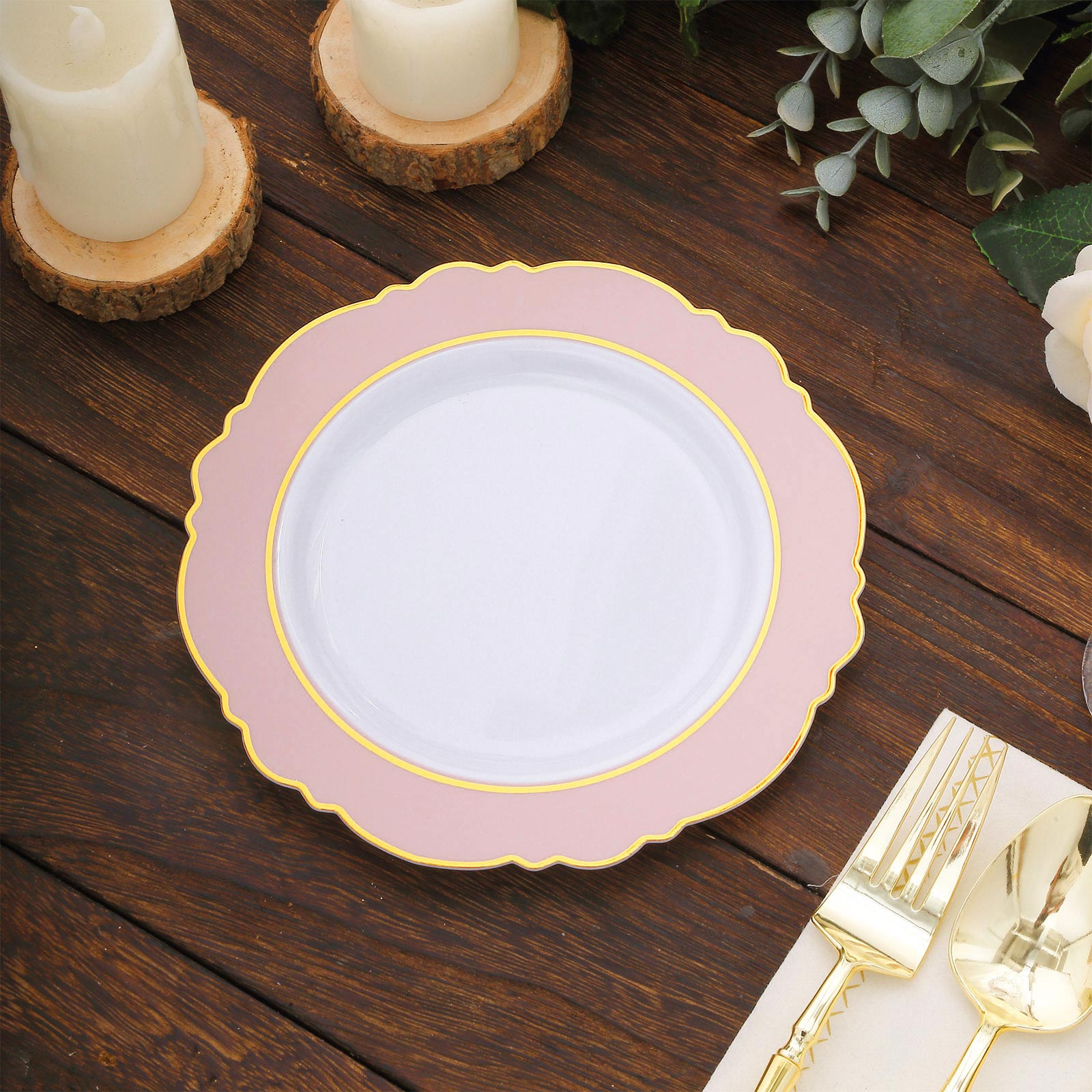 Blush white disposable salad plates with gold rim and round blossom design.