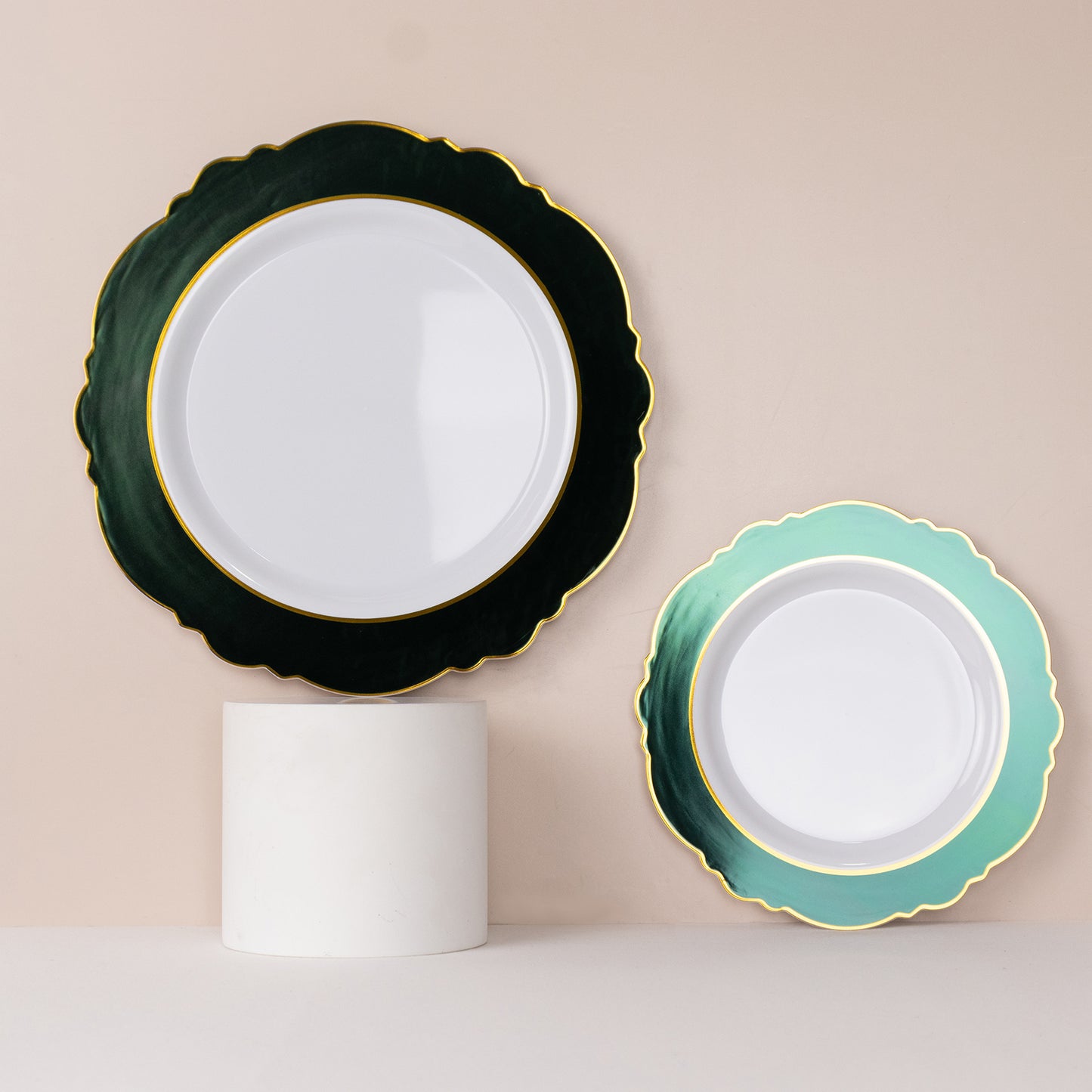 Emerald green and white disposable salad plates with a gold rim.