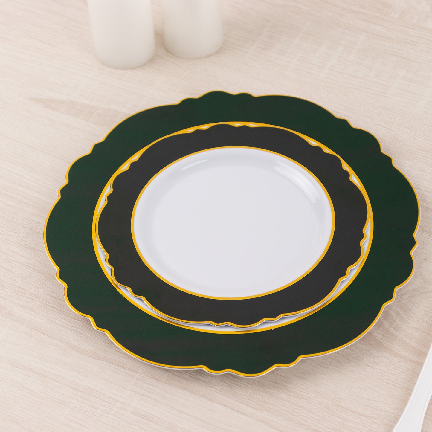 Emerald green and gold rim disposable salad plates with round blossom design.