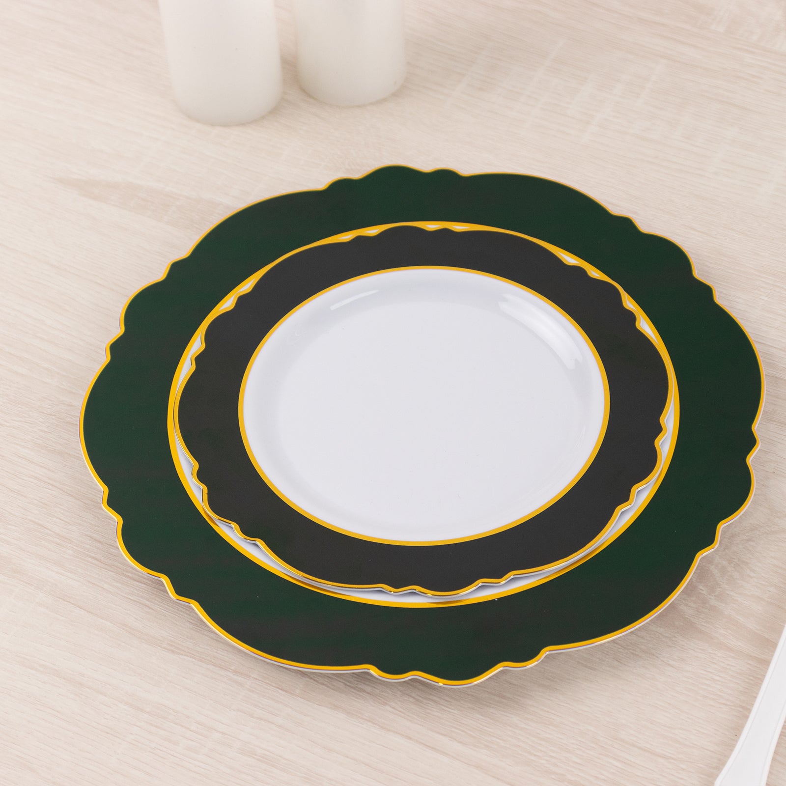 Emerald green and gold rim disposable salad plates with round blossom design.
