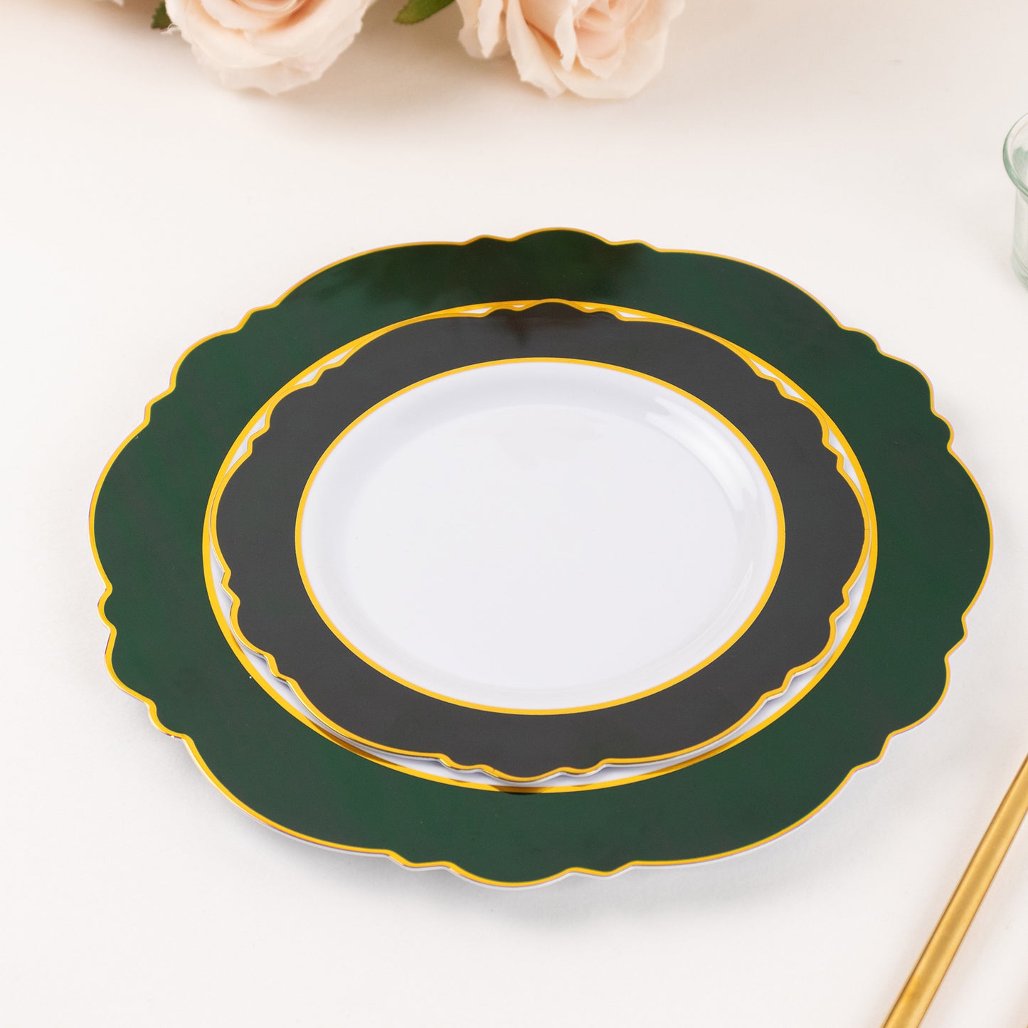 8" emerald green and white disposable salad plates with gold rim.