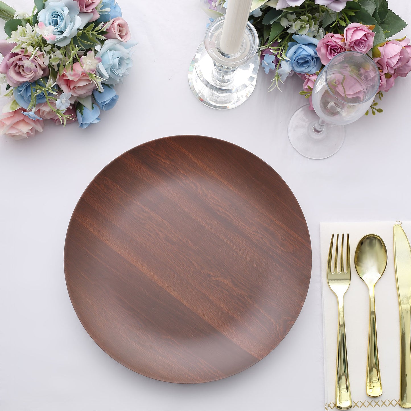 Rustic brown wood grain shatterproof melamine dinner plate on a table setting.