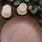 Rustic brown shatterproof melamine dinner plate on a wooden table.