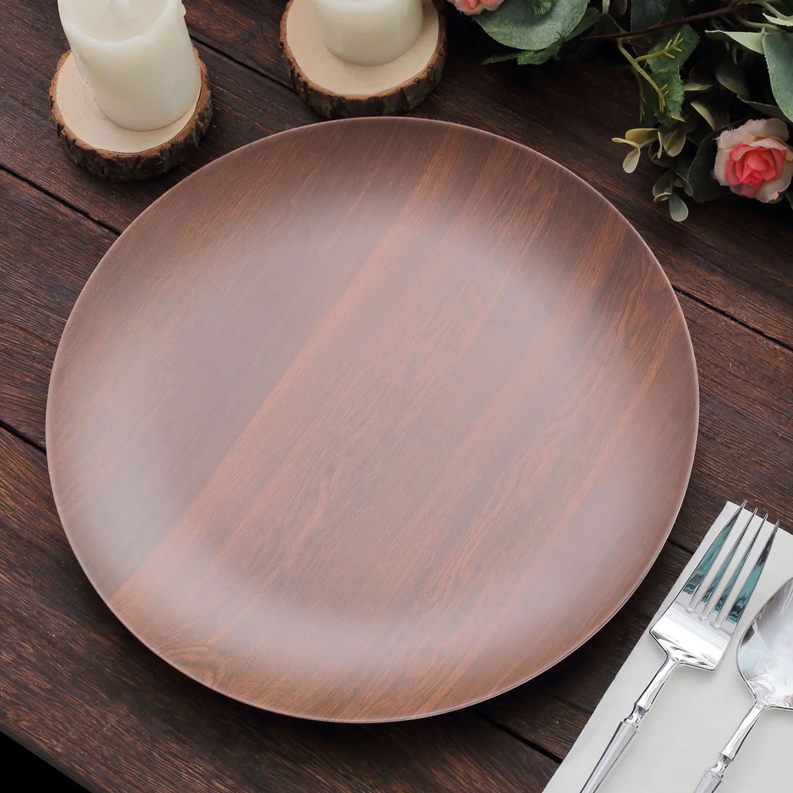 Rustic brown melamine dinner plate on a wooden table with decor.
