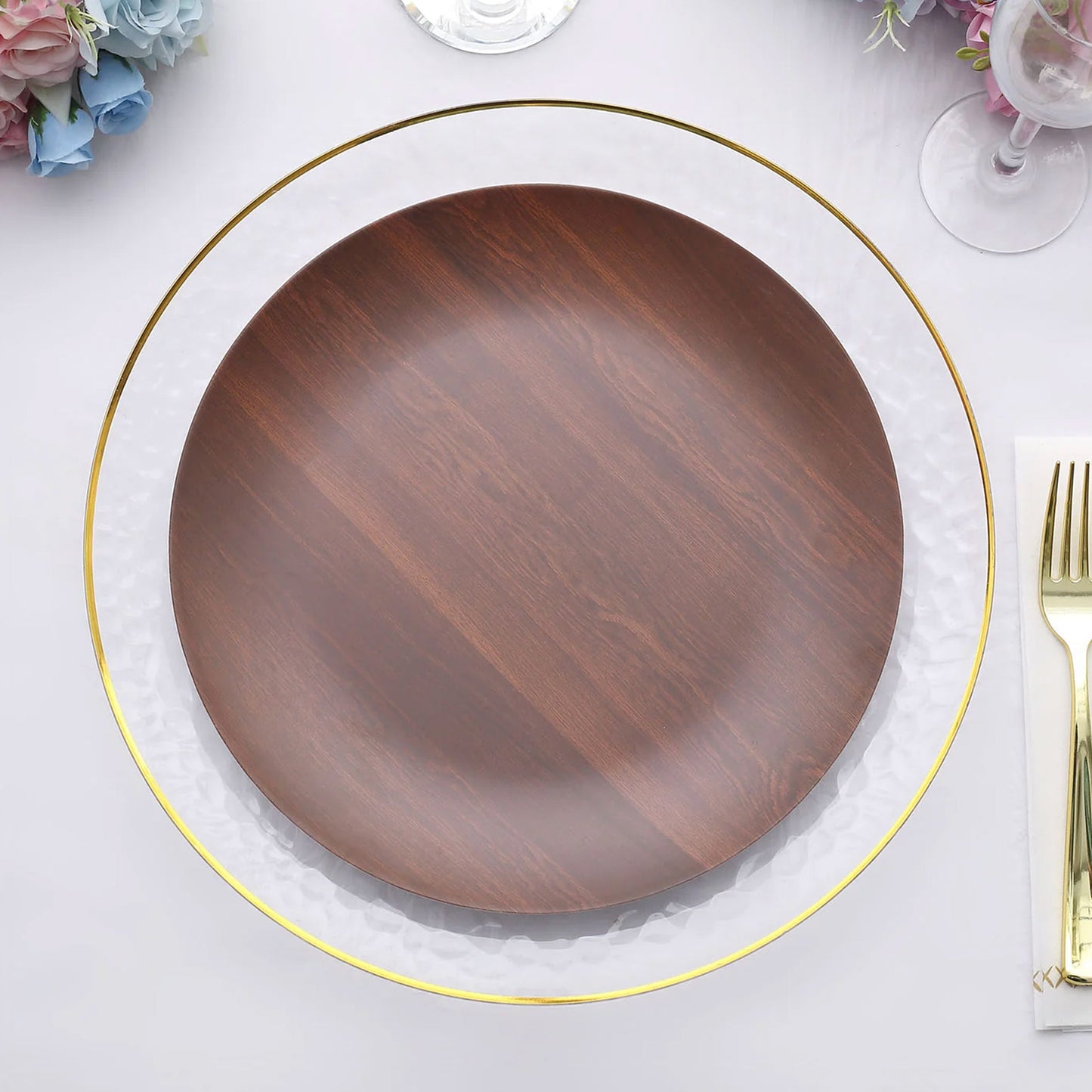 Rustic brown round shatterproof melamine dinner plate on a table setting.