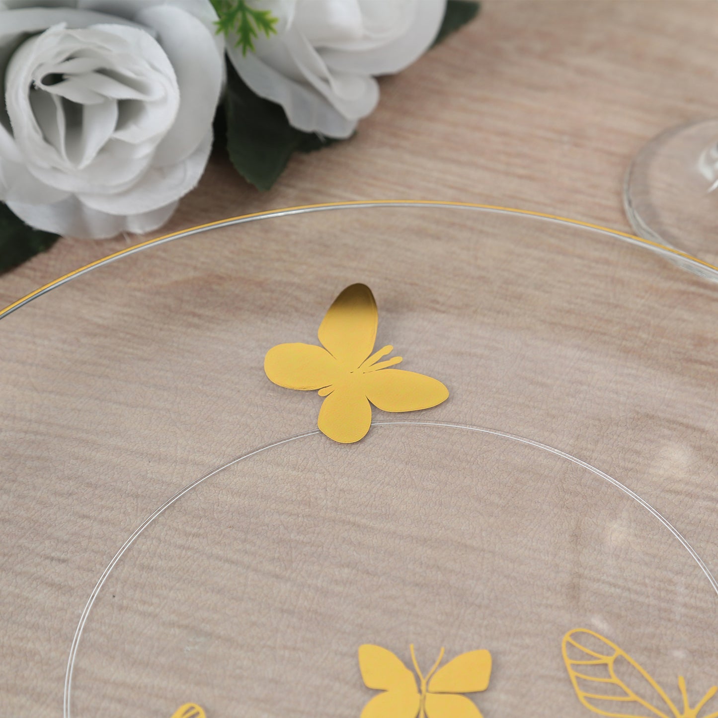Clear gold butterfly plastic party plate with gold rim, 8" and 10" sizes.
