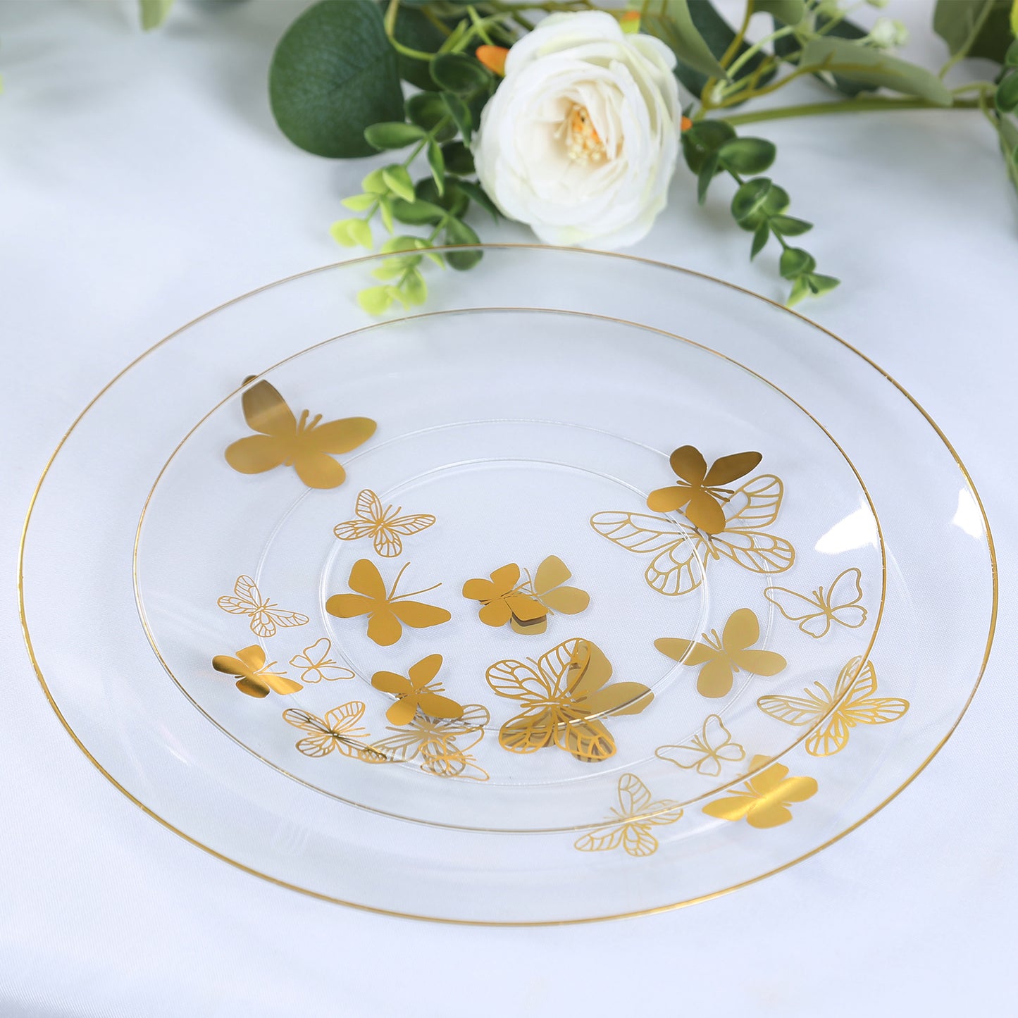 Clear gold butterfly plastic party plate with gold rim, round and disposable.