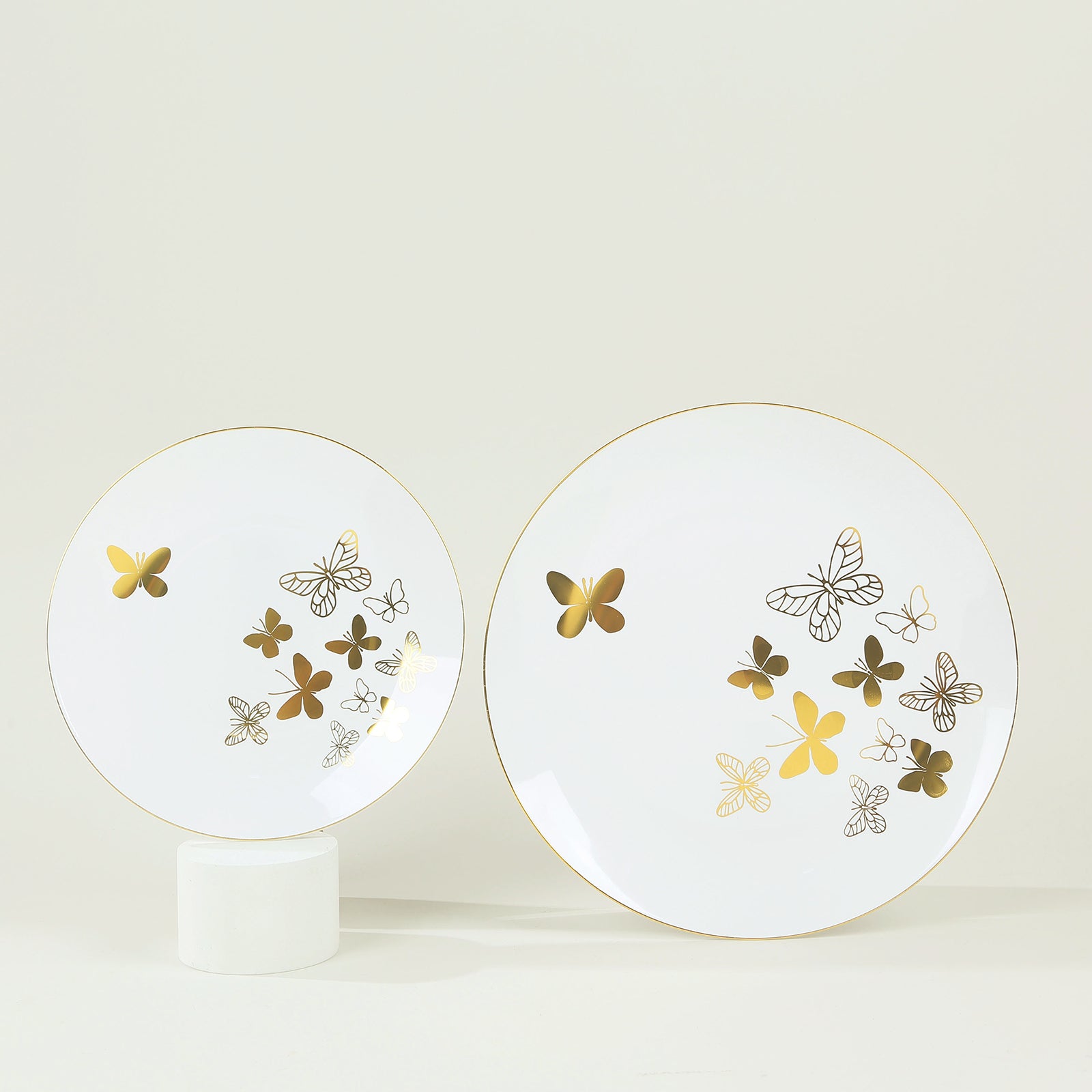 White gold butterfly plates with gold rim, round disposable dinner and salad plates.