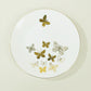 White gold butterfly disposable plate with gold rim, round design.