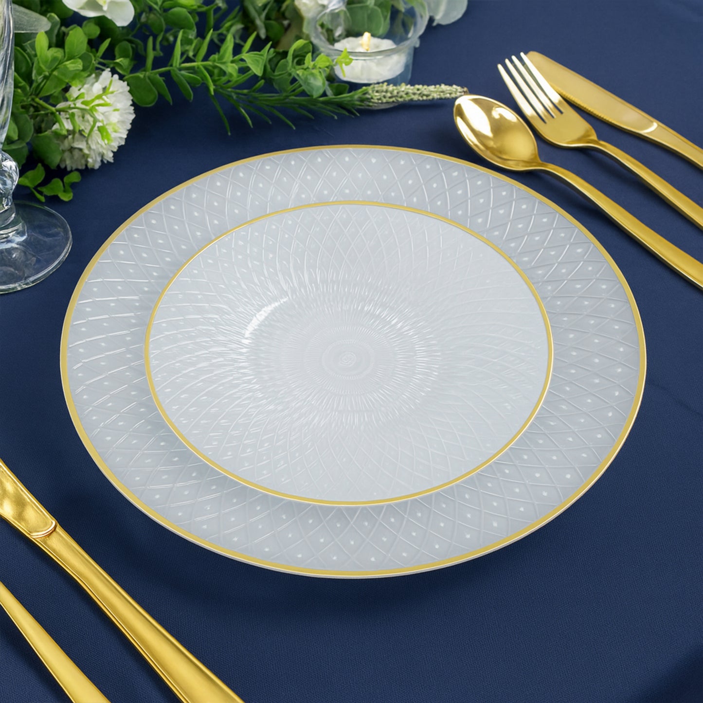 Pearl white plastic dinner plate with gold rim and radial diamond-cut pattern.
