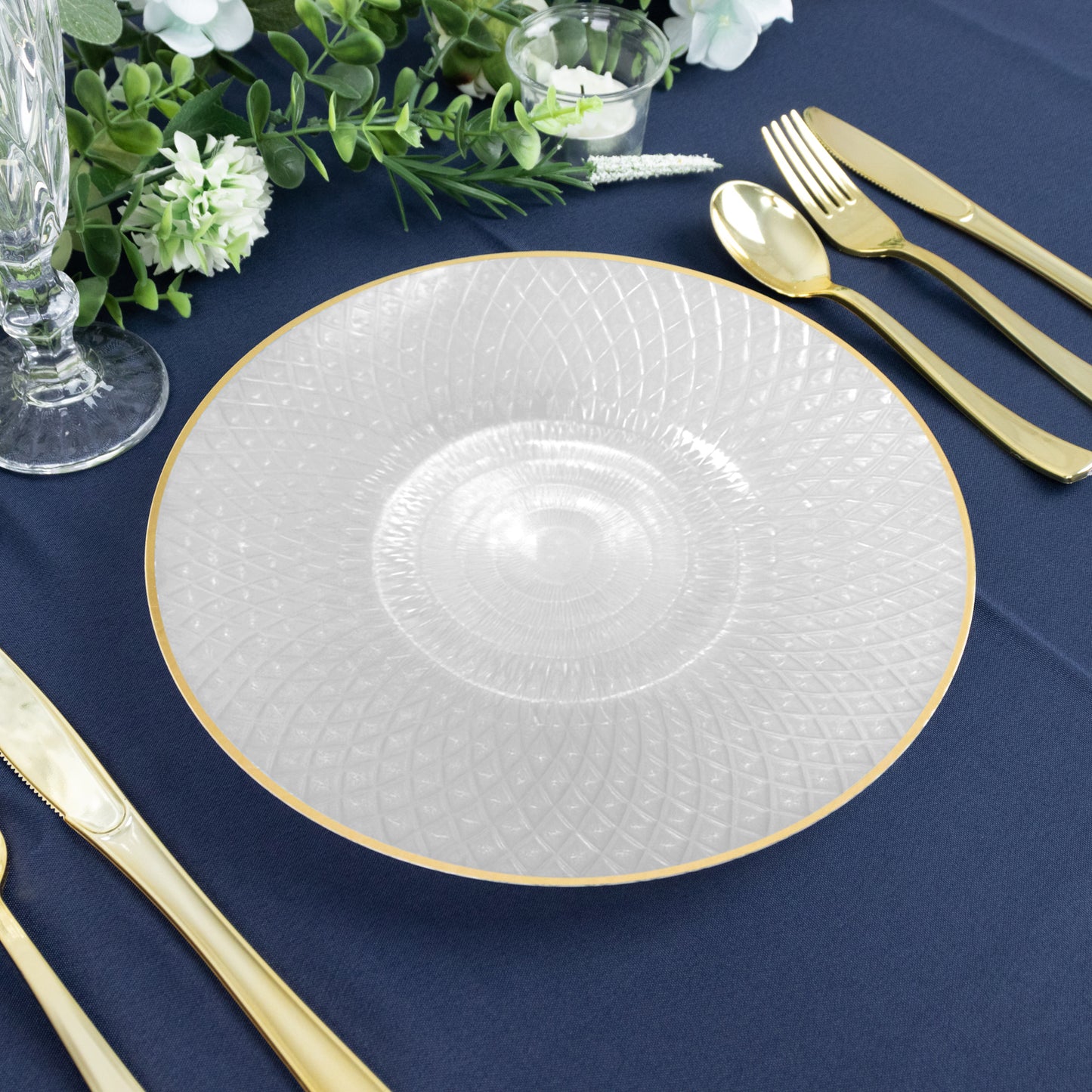 Pearl white plastic dinner plate with gold rim, radial diamond-cut pattern.