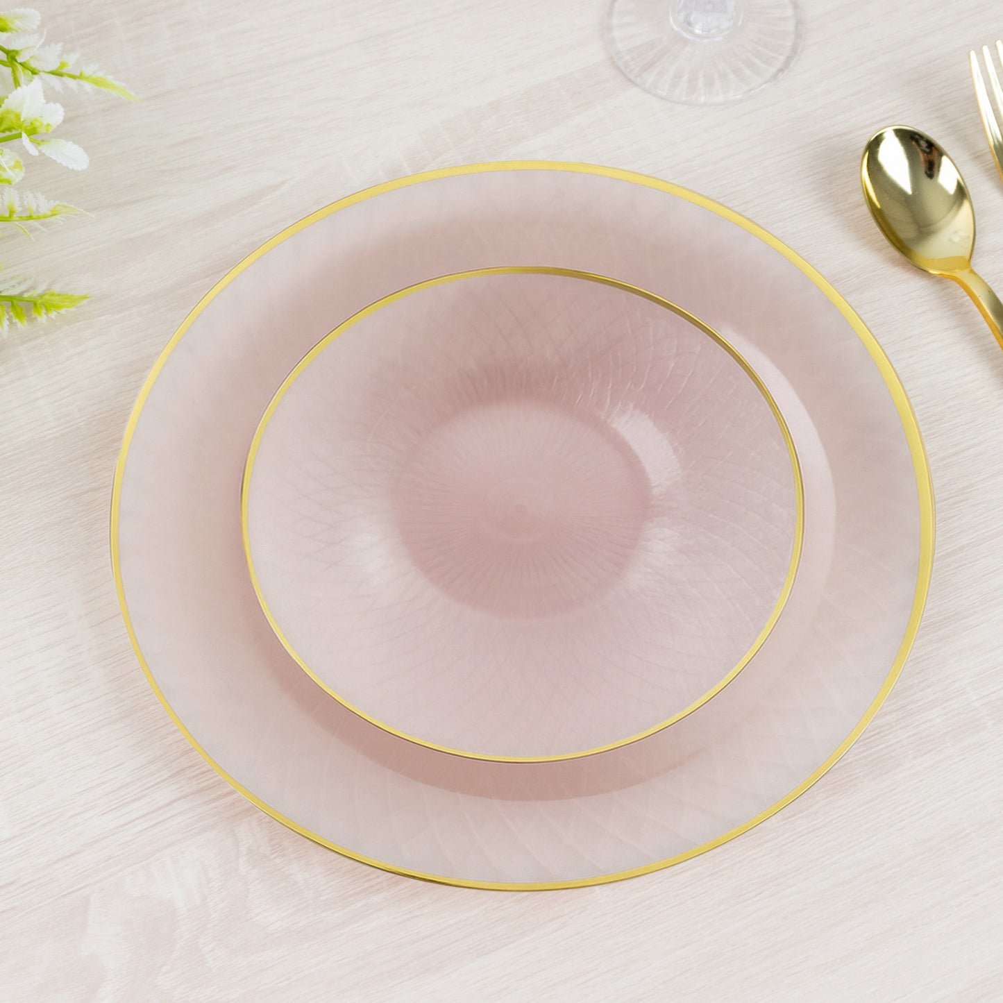 Blush pink plastic dessert plates with gold rim, 20-pack, 7-inch size.