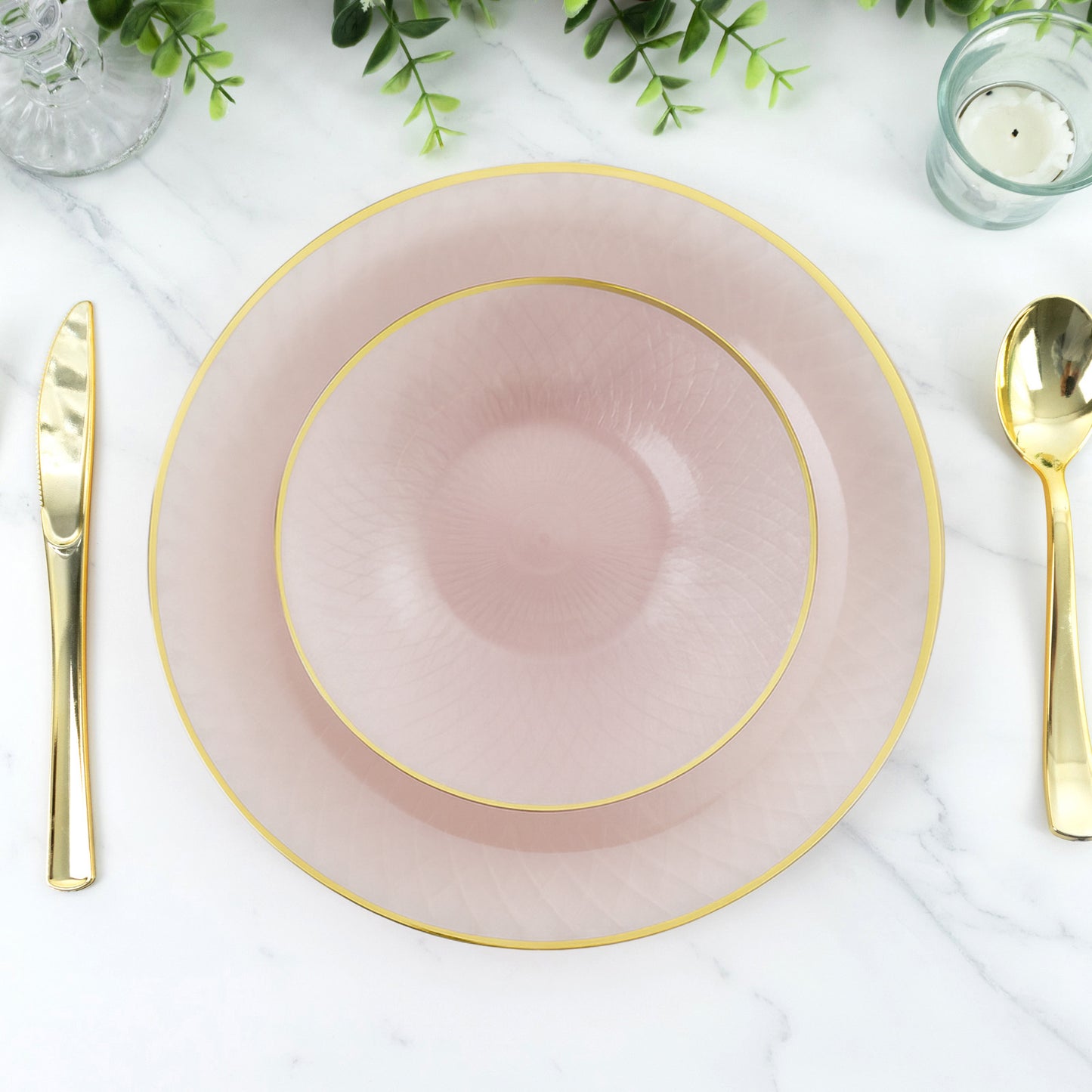 Blush pink round dessert plates with gold rim, 7 inches in diameter.