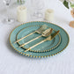 Dusty sage green plastic dessert plates with gold beaded rim.