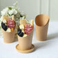 Natural brown paper popcorn boxes with snacks, disposable appetizer cups.