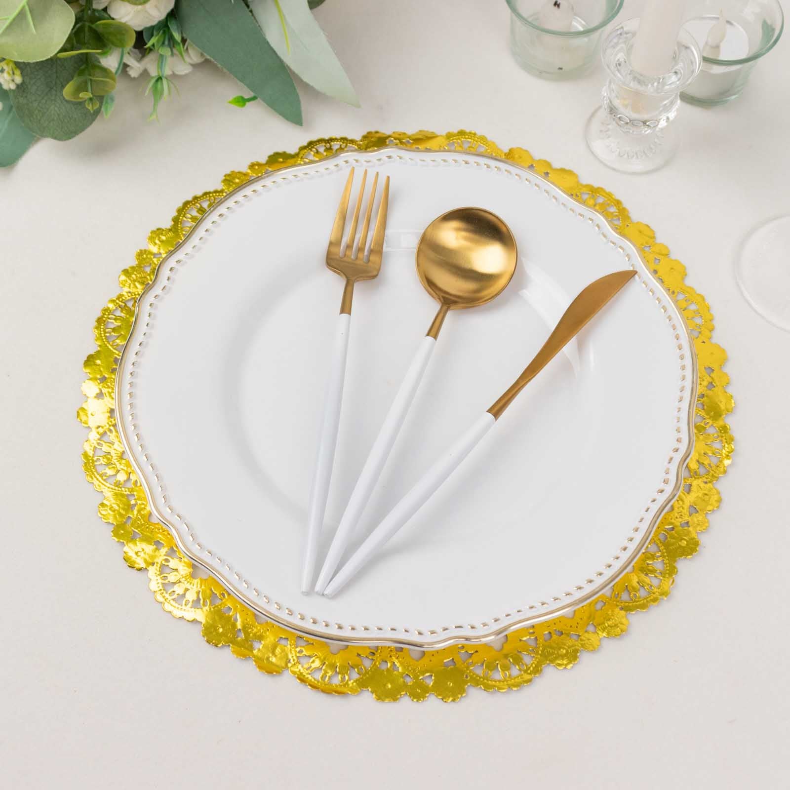 Metallic gold paper lace doily placemat with white and gold utensils.