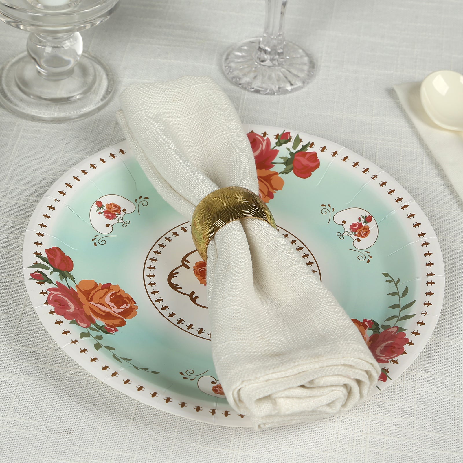 Light turquoise floral paper dinner plate with rose print.
