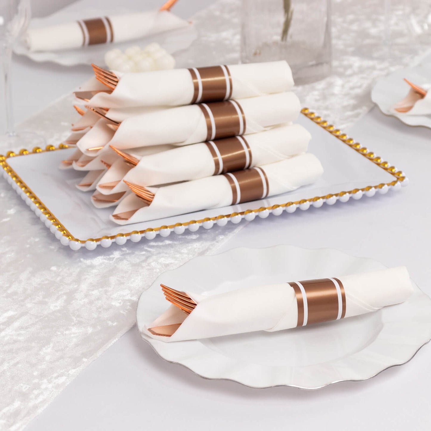 Set of 24 Pre Rolled Plastic Silverware Sets in Rose Gold with White Paper Napkins, Disposable Wrapped Cutlery Set - 24 Napkins, 24 Spoons, 24 Forks and 24 Knives