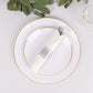 Set of 24 silver plastic cutlery with white napkins on a plate.