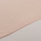 Blush spandex 4-way stretch fabric roll, 60"x10 yards, perfect for DIY crafts.