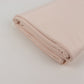Blush spandex 4-way stretch fabric roll, 60"x10 yards, folded and ready for crafts.