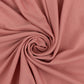 Dusty rose spandex fabric roll, 60"x10 yards, perfect for DIY crafts.