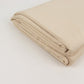 Beige spandex 4-way stretch fabric roll, 60"x10 yards, perfect for DIY crafts.