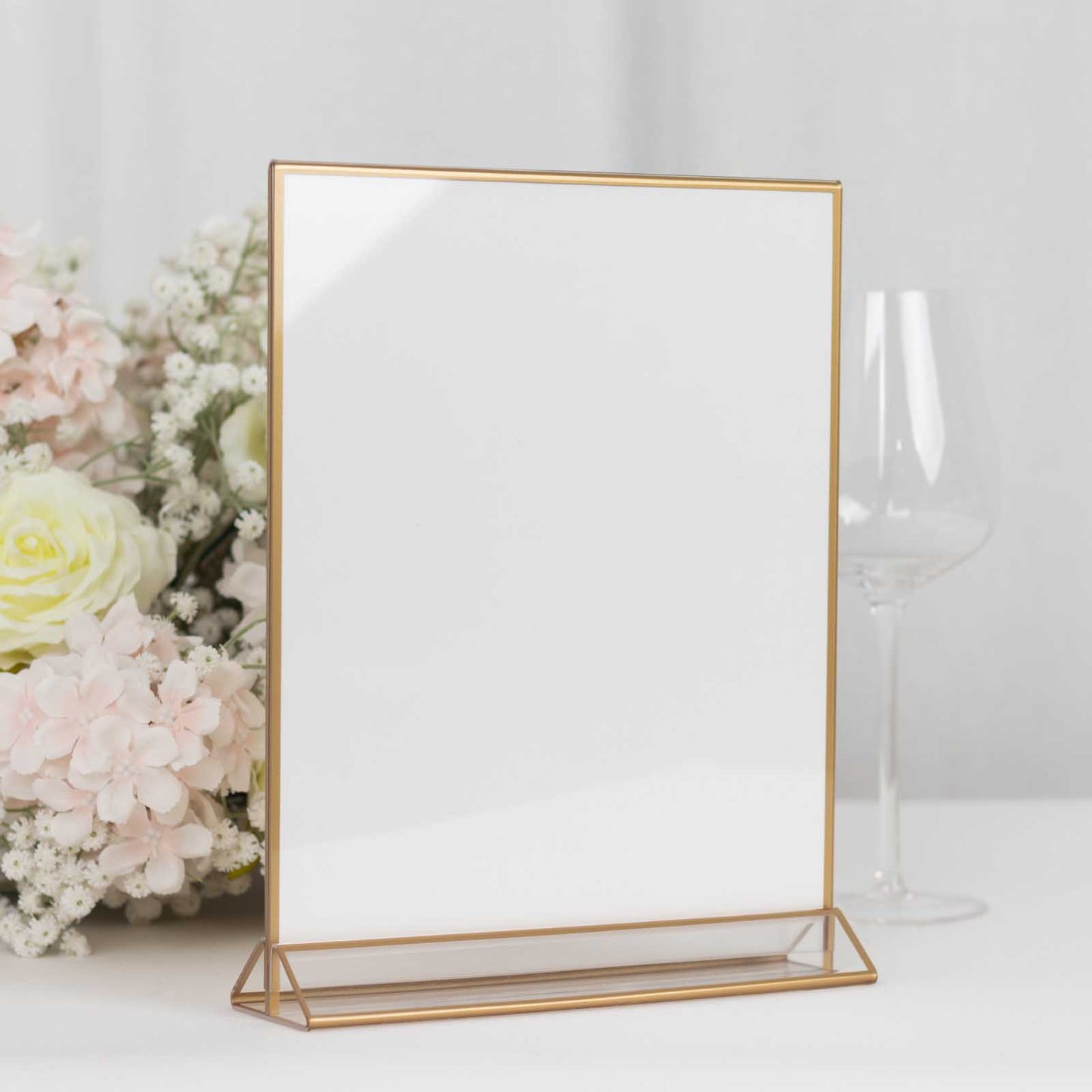 Gold freestanding table display stand for menus or pictures, 9"x11", double-sided.