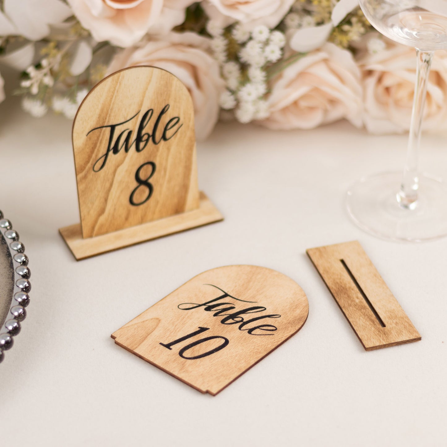 Natural rustic wooden table numbers for weddings and events.
