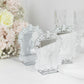 Silver mirror arch table numbers with white print and baroque lace border.