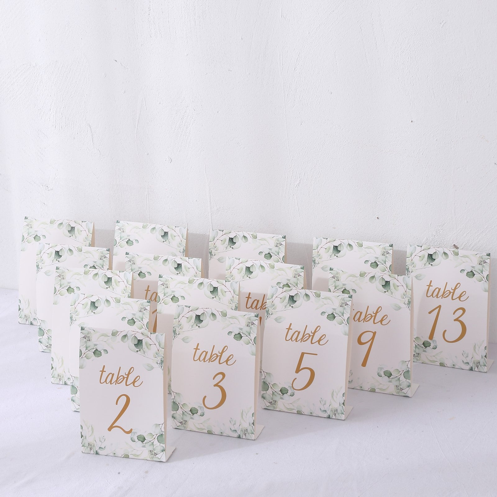 25 Pack White Green Wedding Table Numbers with Eucalyptus Leaves and Gold Foil Numbers Print, 7" Free Standing Double Sided Paper Table Sign Cards 1-25