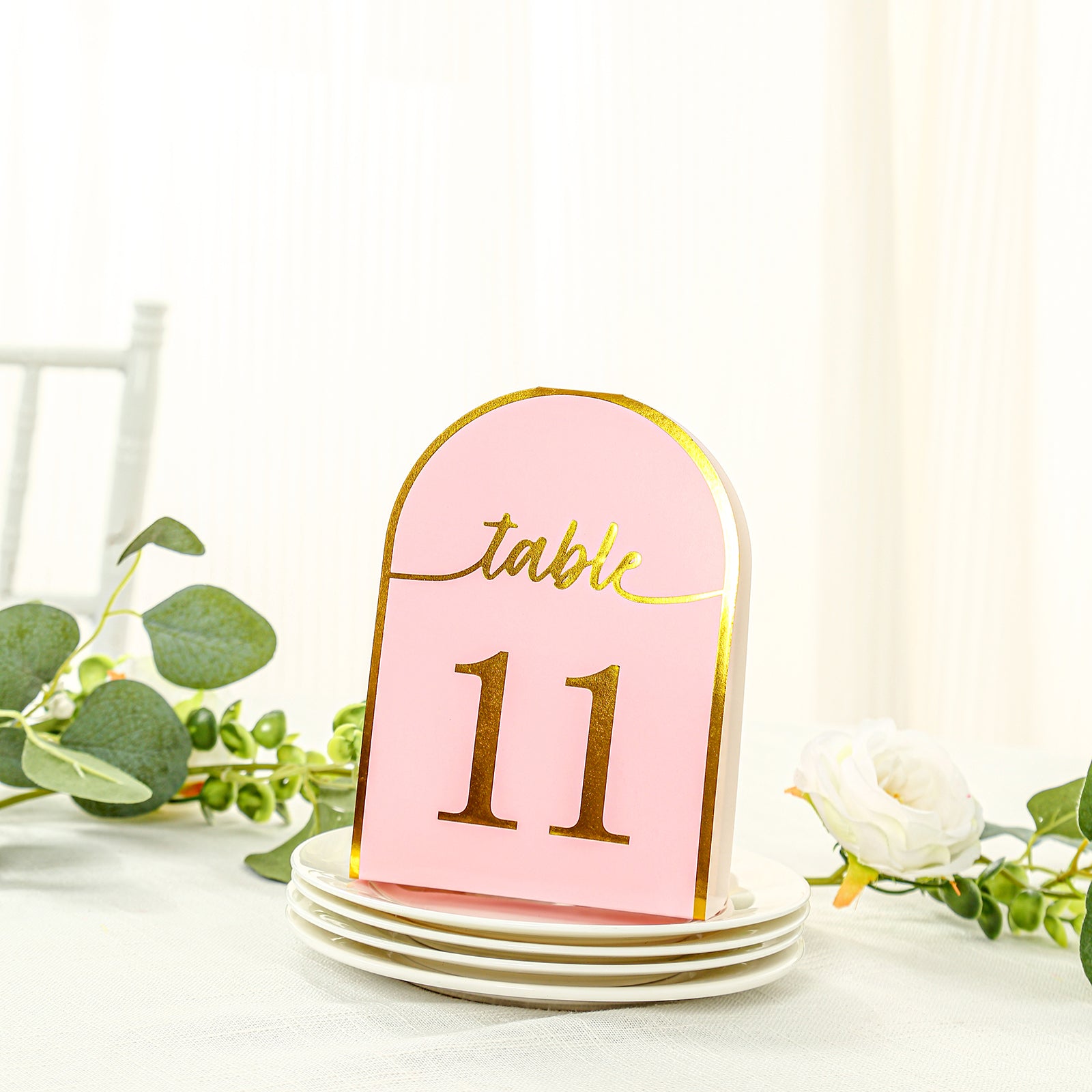 Blush pink table number card with metallic gold foil number 11.