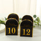 Black and gold table numbers, double-sided, for events and dining.