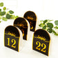 Black and gold disposable table numbers, double-sided, numbers 1-25.