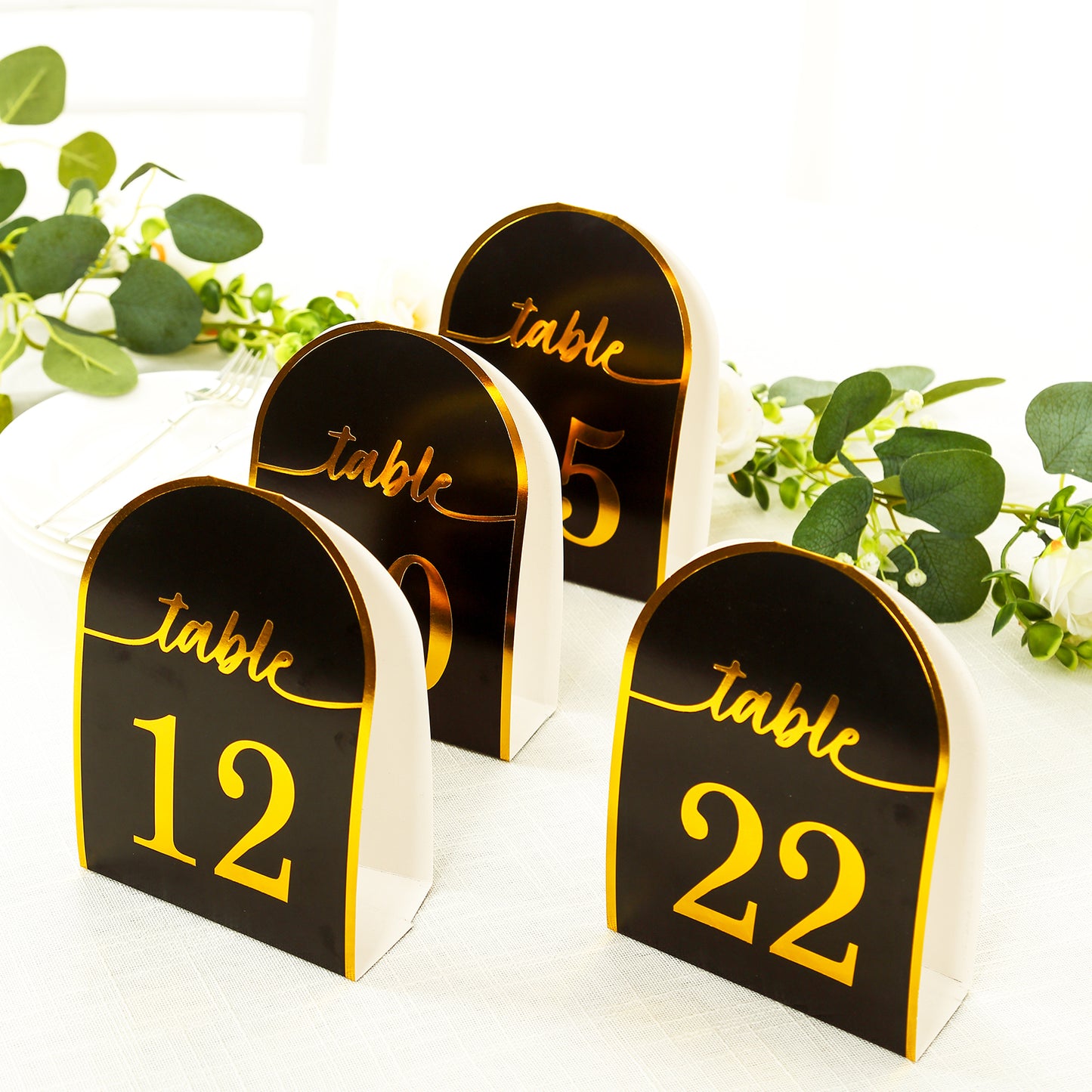 Black and gold disposable table numbers, double-sided, numbers 1-25.