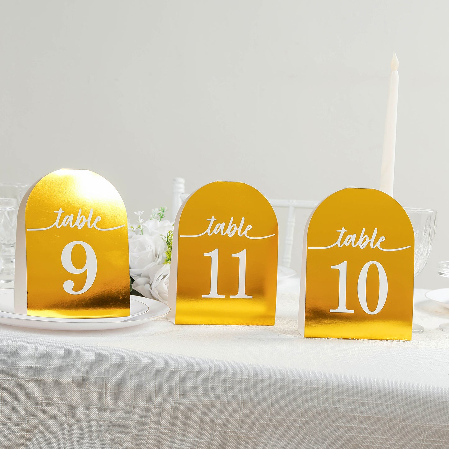 Metallic gold table numbers 1-25, double-sided with white numbers.
