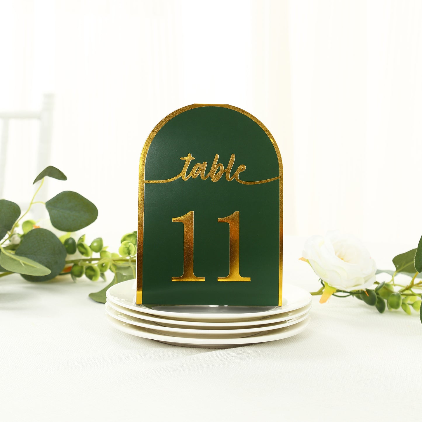 Hunter emerald green table number card with metallic gold foil number 11.