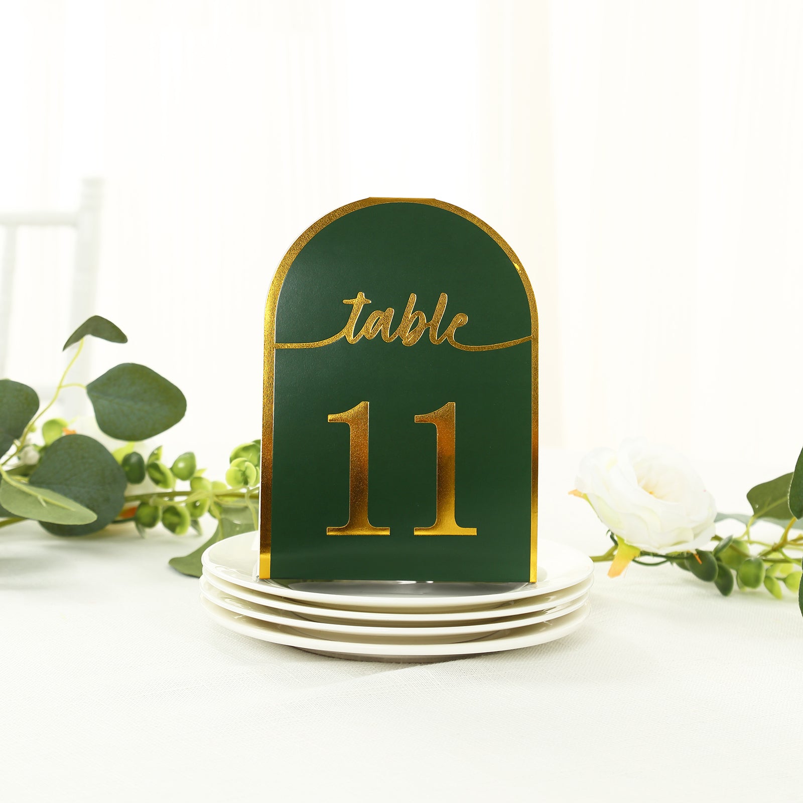 Hunter emerald green table number card with metallic gold foil number 11.