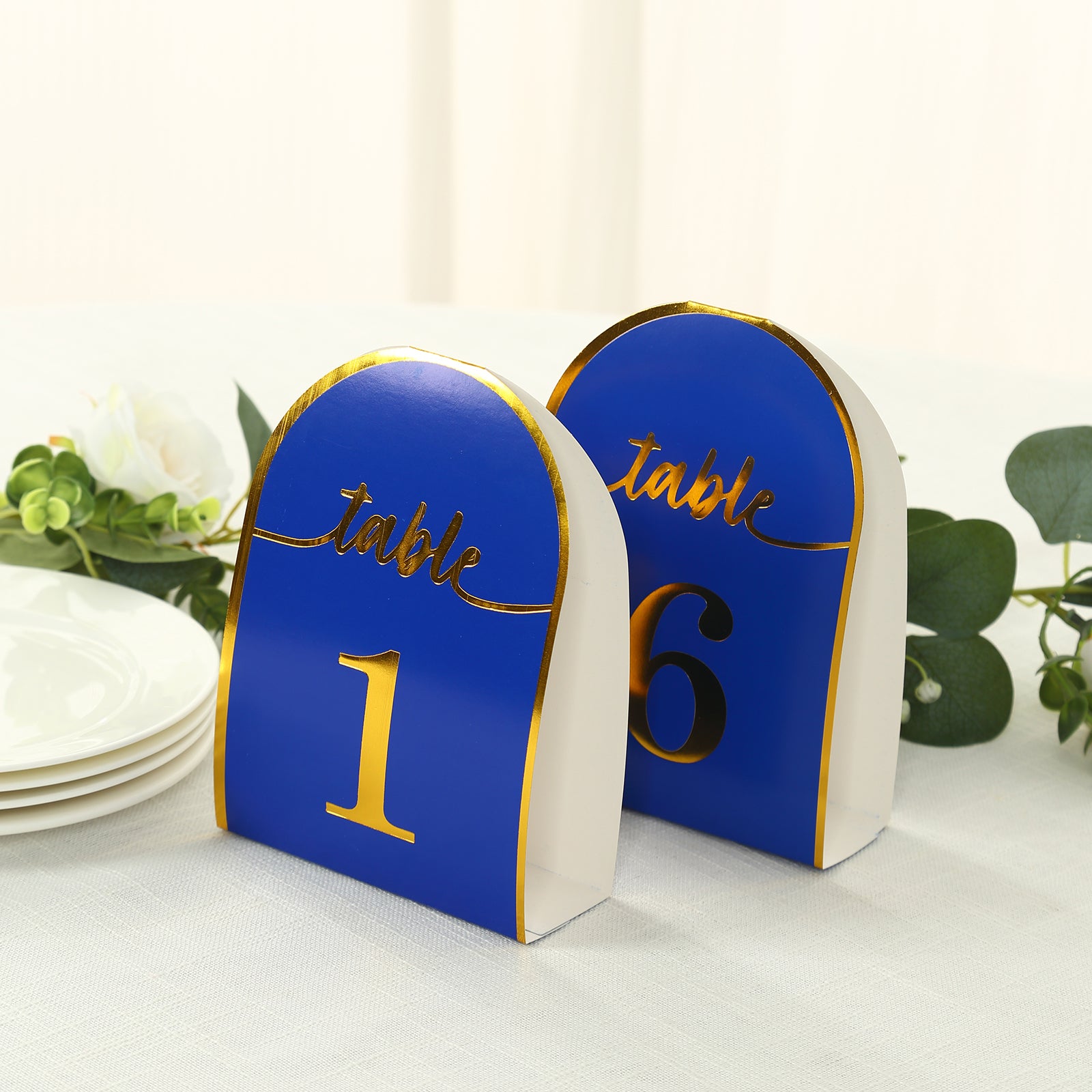 Royal blue double-sided table numbers with metallic gold foil, numbers 1-25.