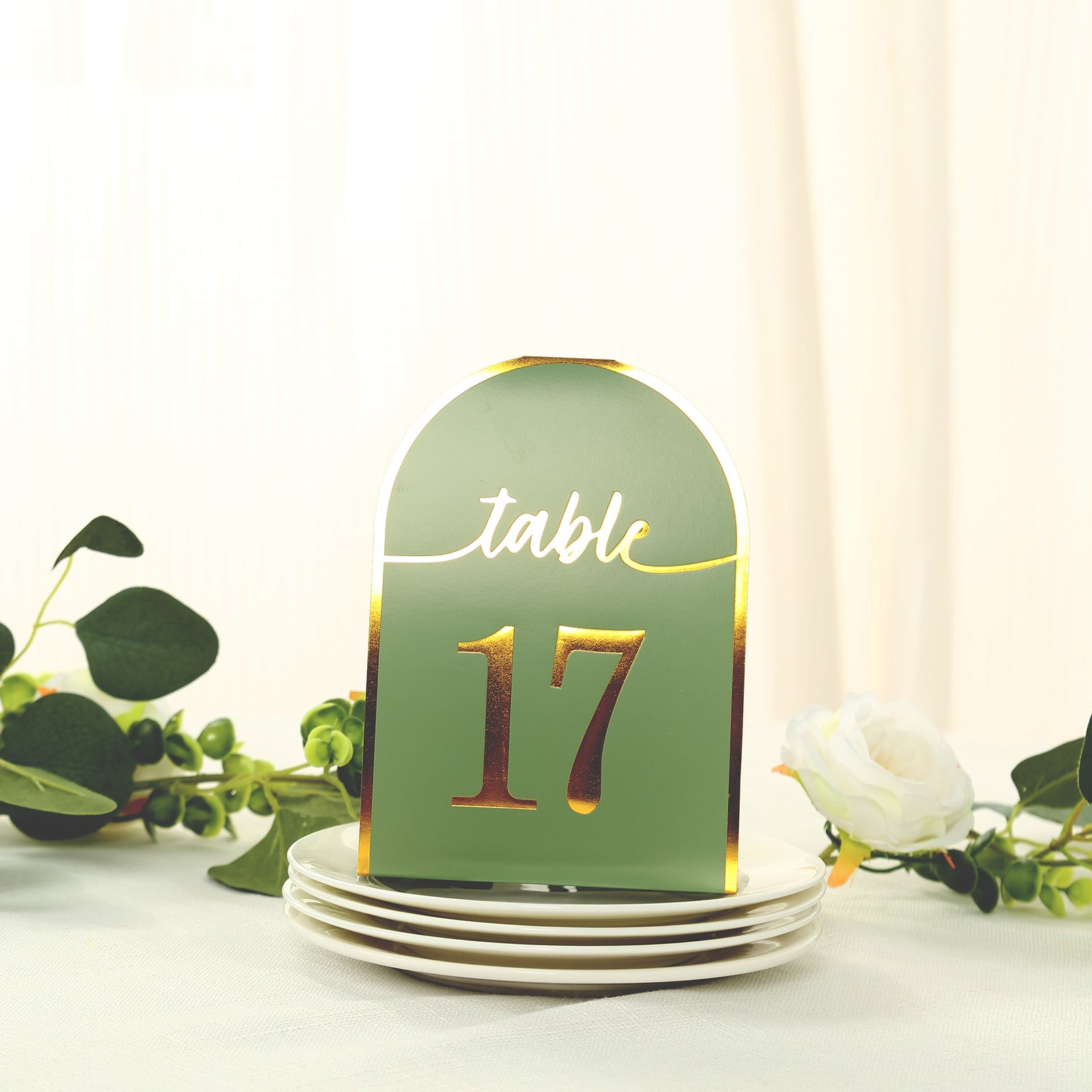 Sage green table number card with metallic gold foil number 17.