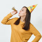 Gold metallic party horn noisemaker with tassels for celebrations.