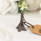 Bronze Eiffel Tower keychain wedding favor with thank you tag.