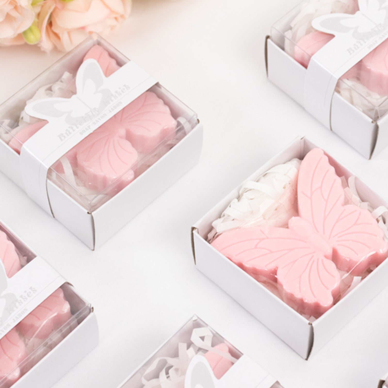 Blush butterfly soap favors in gift boxes for baby shower and bridal shower.