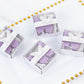 Lavender butterfly soap favors in gift boxes for baby showers.