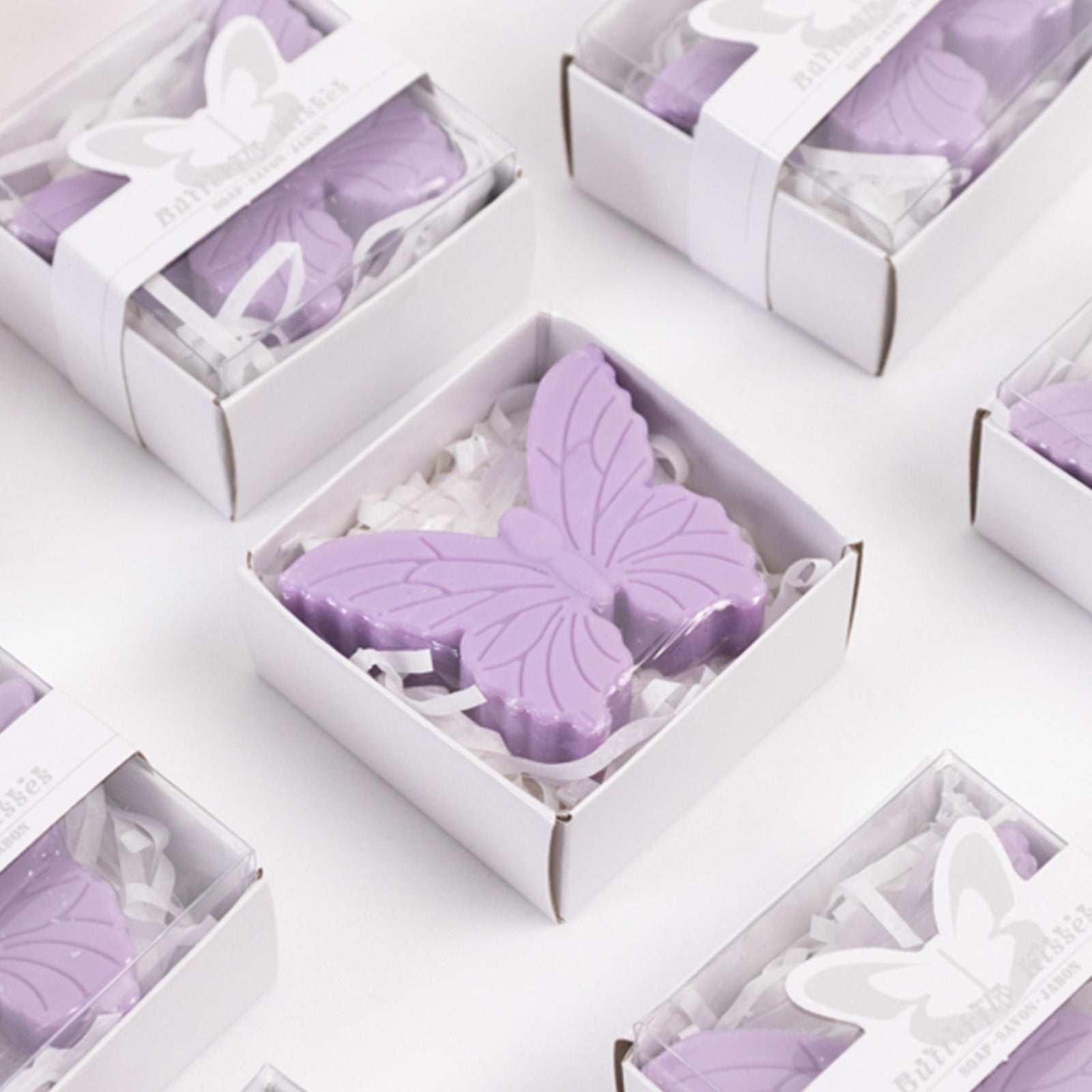 Lavender butterfly soap favors in gift boxes for baby or bridal showers.