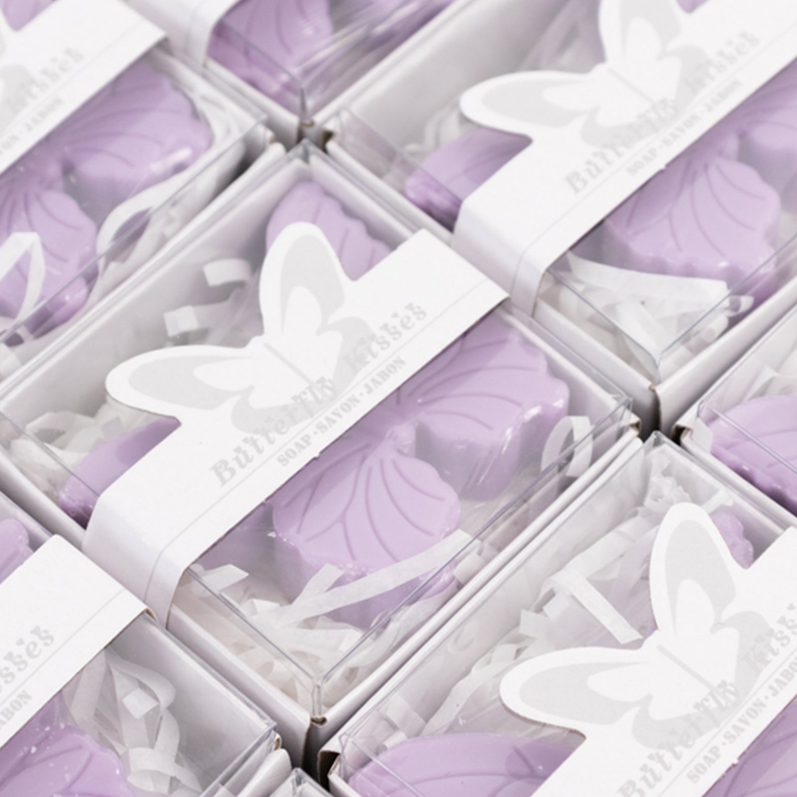 Lavender butterfly soap favors in gift boxes for baby shower or wedding.