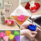 Blush scented rose soap heart-shaped party favors in gift boxes.