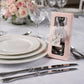 Engraved silver heart measuring spoon set in a decorative gift box.